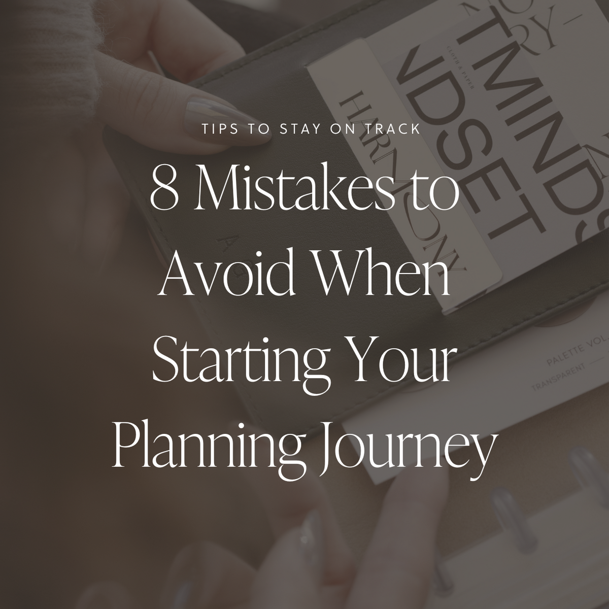 Close-up of a hand holding an open planner, with journaling cards tucked into the cover pocket, with a text overlay that reads: "Tips to Stay on Track: 8 Mistakes to Avoid When Starting Your Planning Journey."