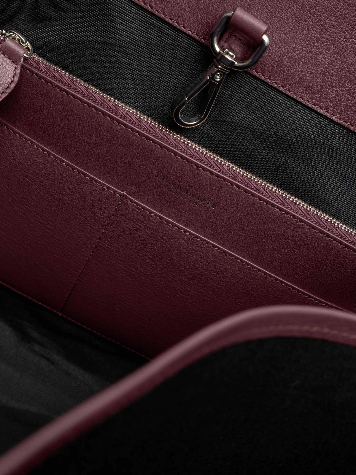 Detail view of the open pockets in The Metro Tote in the color Madrid.