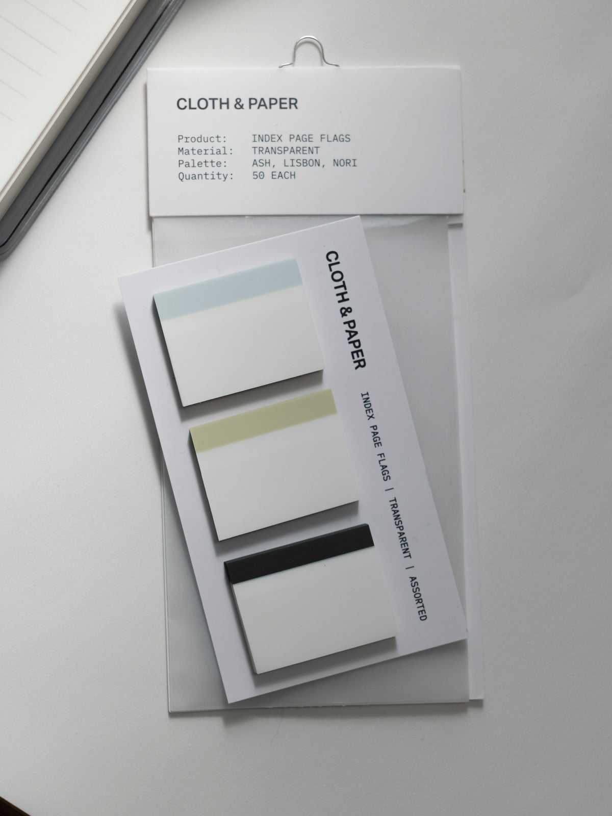 Index Page Flag Set in light blue, light green, and charcoal on a backing card