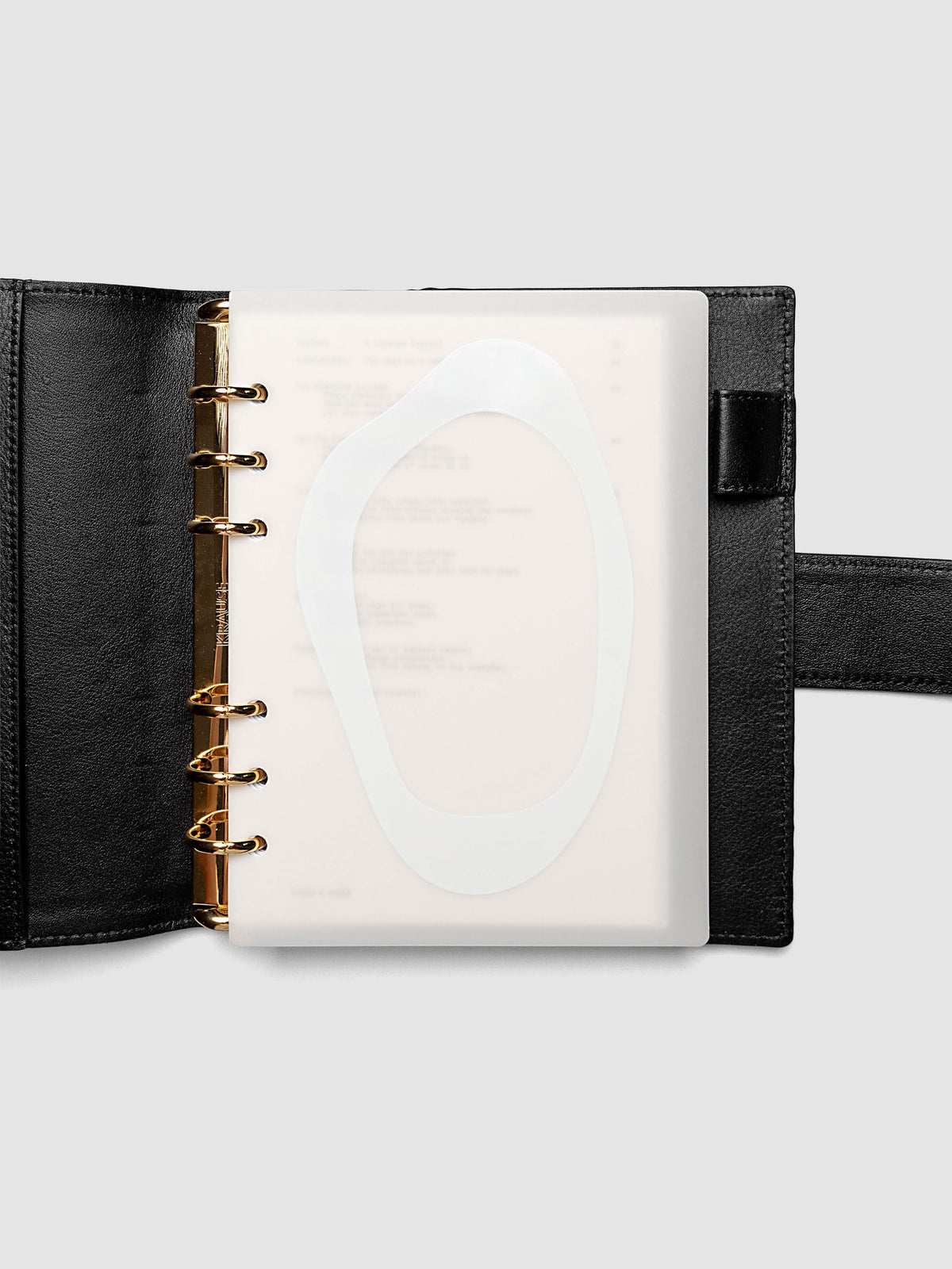 Continuation Planner Cover + Dashboard Set in Personal Wide. Milky white frosted plastic cover with a spot gloss organic shape over a black-printed paper dashboard. Image 3 of 3.