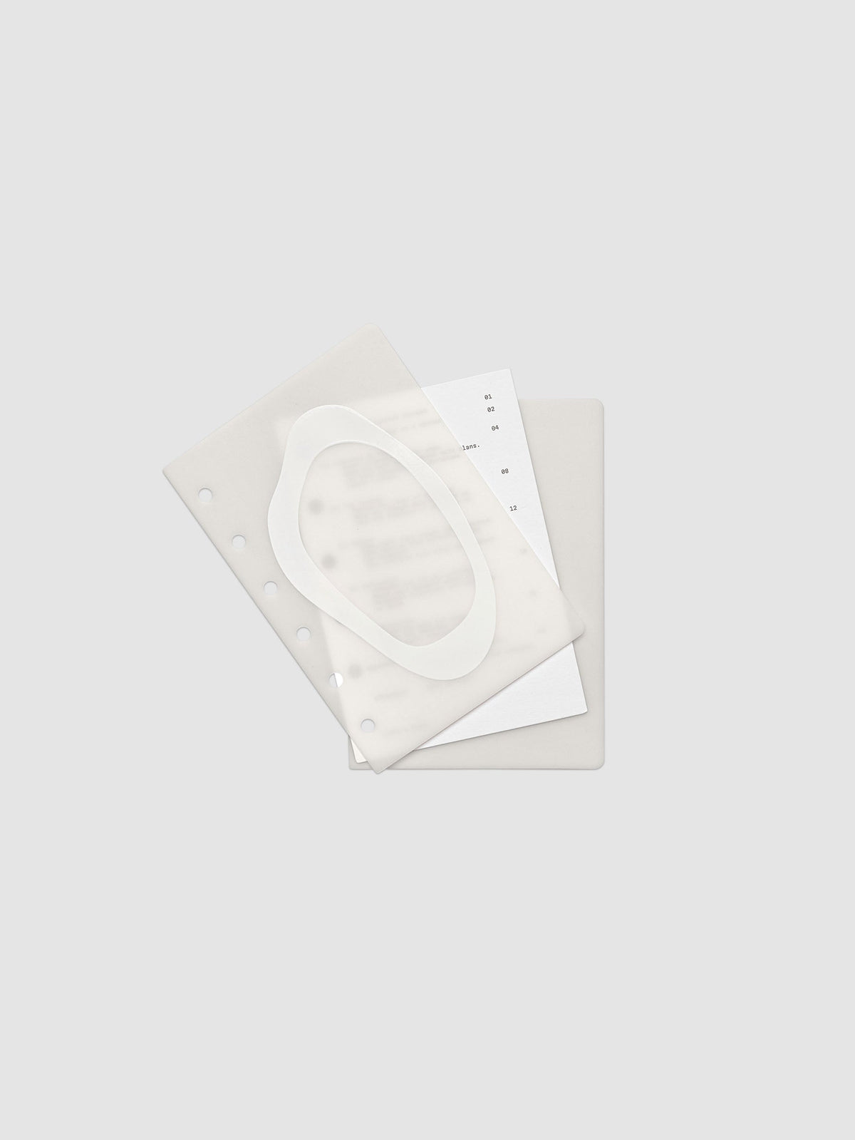 Continuation Planner Cover + Dashboard Set in Pocket. Milky white frosted plastic cover with a spot gloss organic shape over a black-printed paper dashboard. Image 2 of 3.