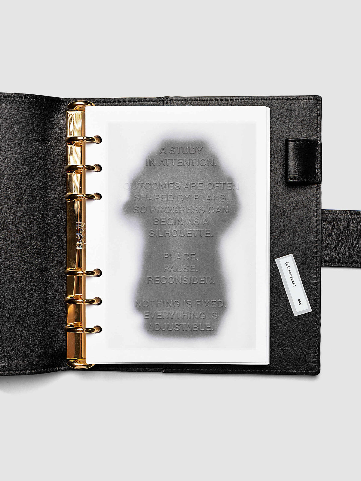 Silhouette Planner Dashboard in Personal Wide. Greyscale silhouette print with embossed text on paper. Image 2 of 2.