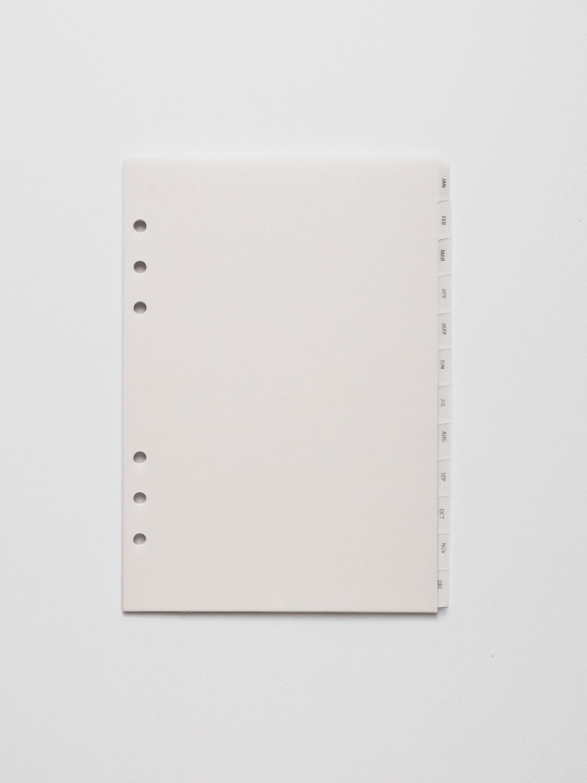 A5 vellum dividers shown on a grey background.