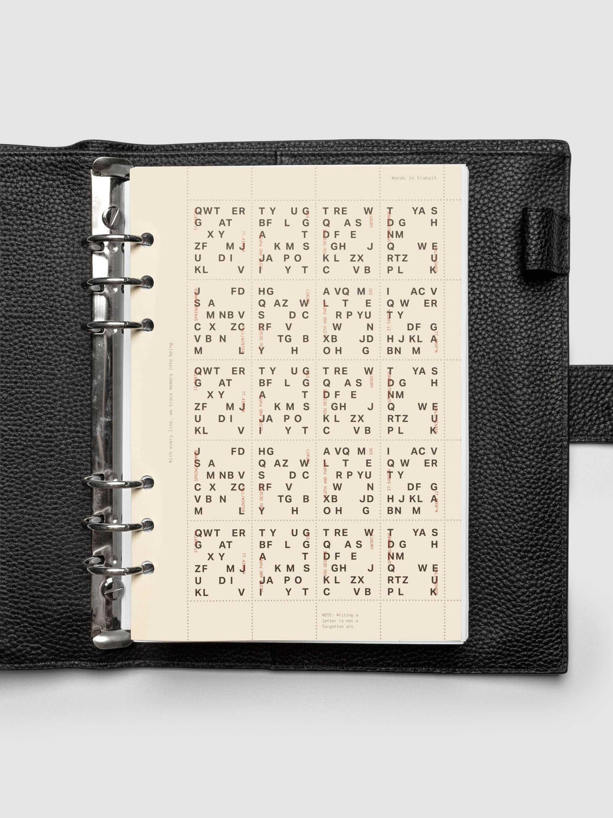 Stamp Sheet Planner Dashboard shown in a A5 black leather agenda.