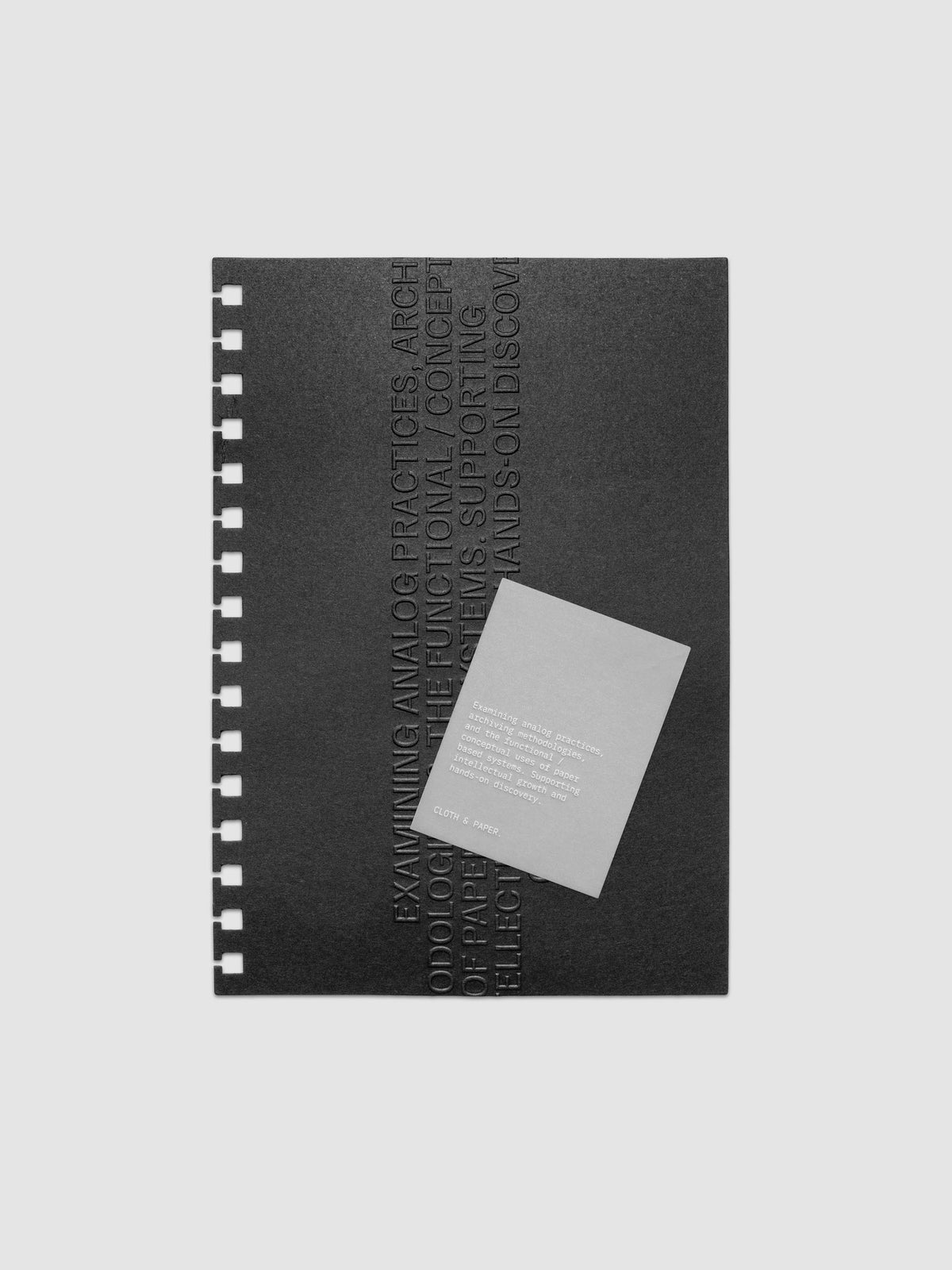 Black embossed Analog Embossed Planner Dashboard with drop card shown in size A5 Spiral.