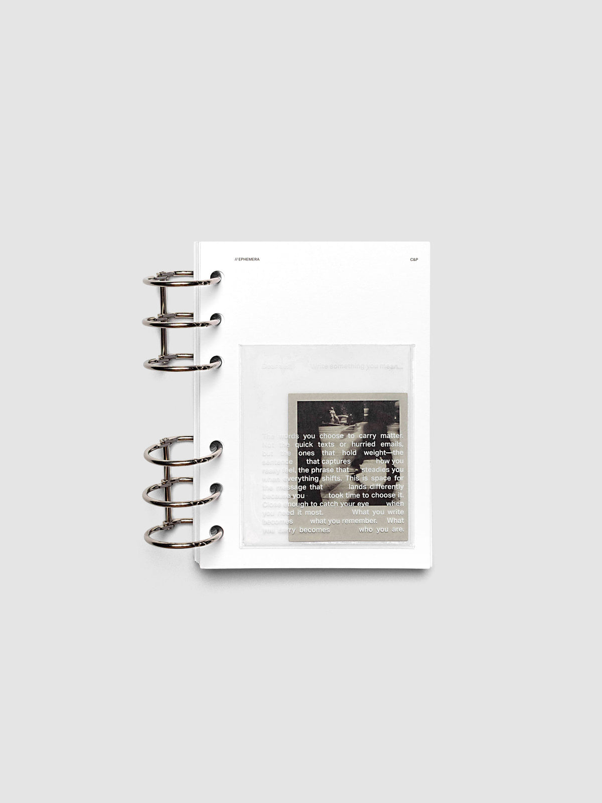 White Ephemera Planner Dashboard shown ring bound in size A6.