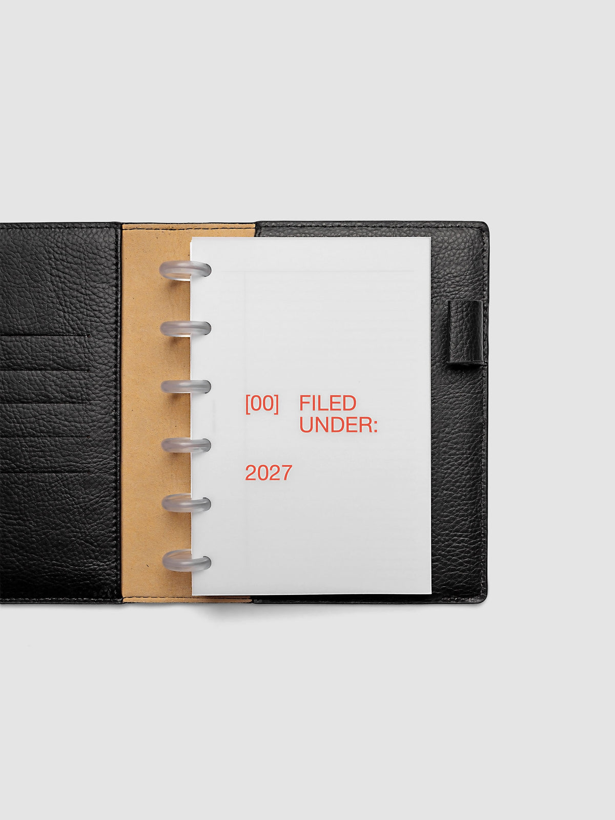 2027 Front + Monthly Dashboard Overlays, Saffron, CP Petite 6-Disc Punch, vellum dashboard overlay shown layered inside a planner