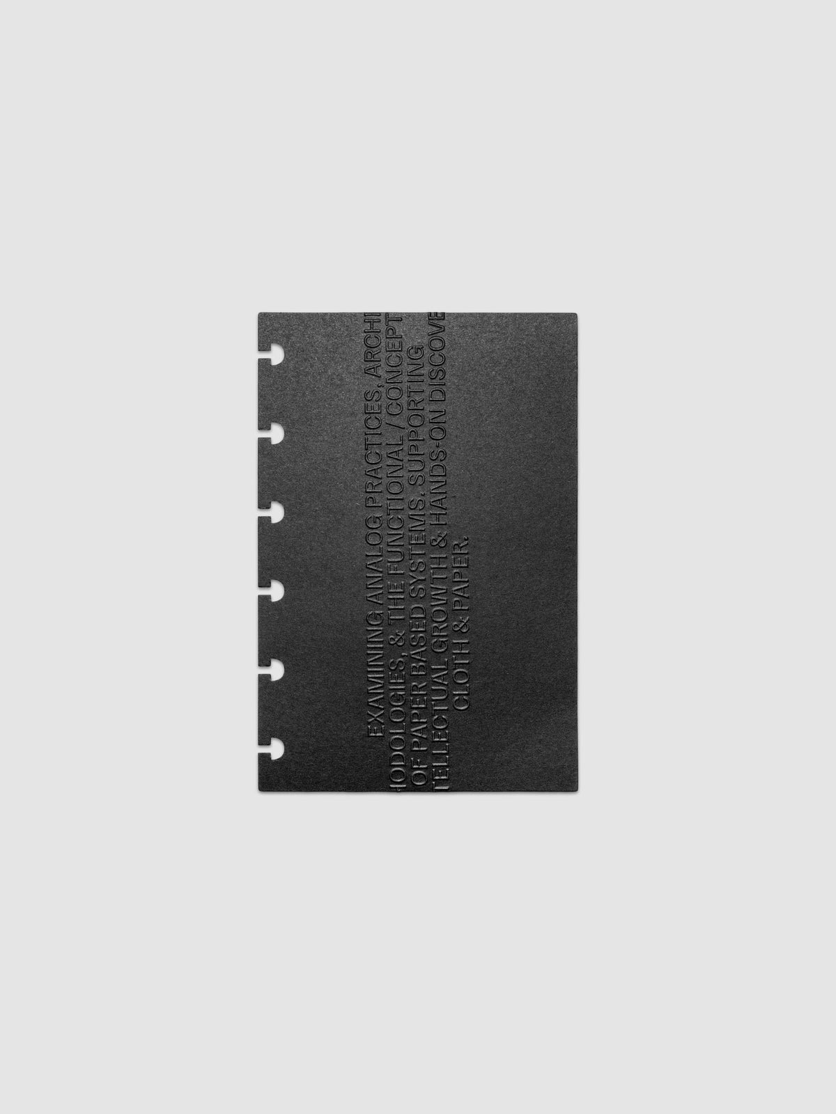 Black embossed Analog Embossed Planner Dashboard without the drop card shown in size CP Petite.