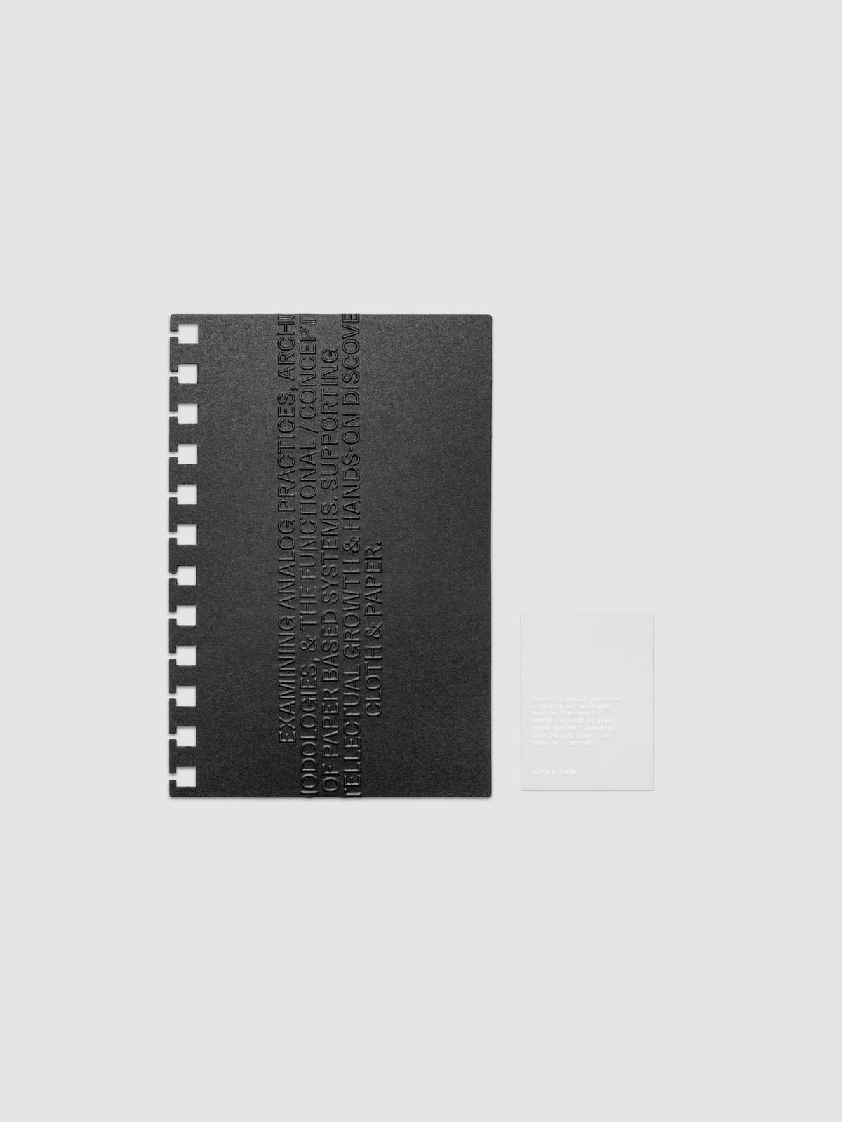 Black embossed Analog Embossed Planner Dashboard with drop card shown in size CP Petite Spiral.