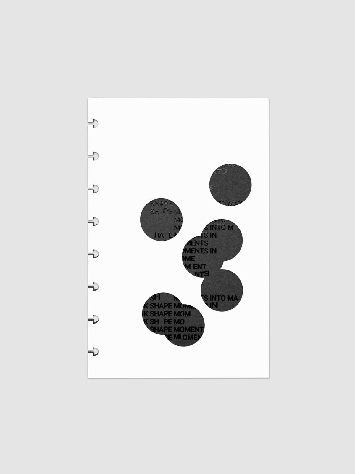 Black and white Ink Blot Planner Dashboard Duo shown layered in size Half Letter, pre-punched for discbound planners.
