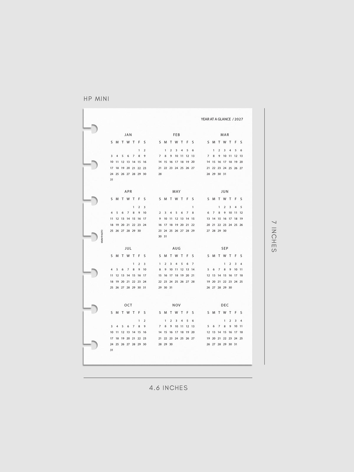 2027 Year At A Glance Dashboard Sunday Start, HP Mini 7-Disc Punch, translucent vellum dashboard printed with a full 2027 year-at-a-glance calendar in Sunday-start format