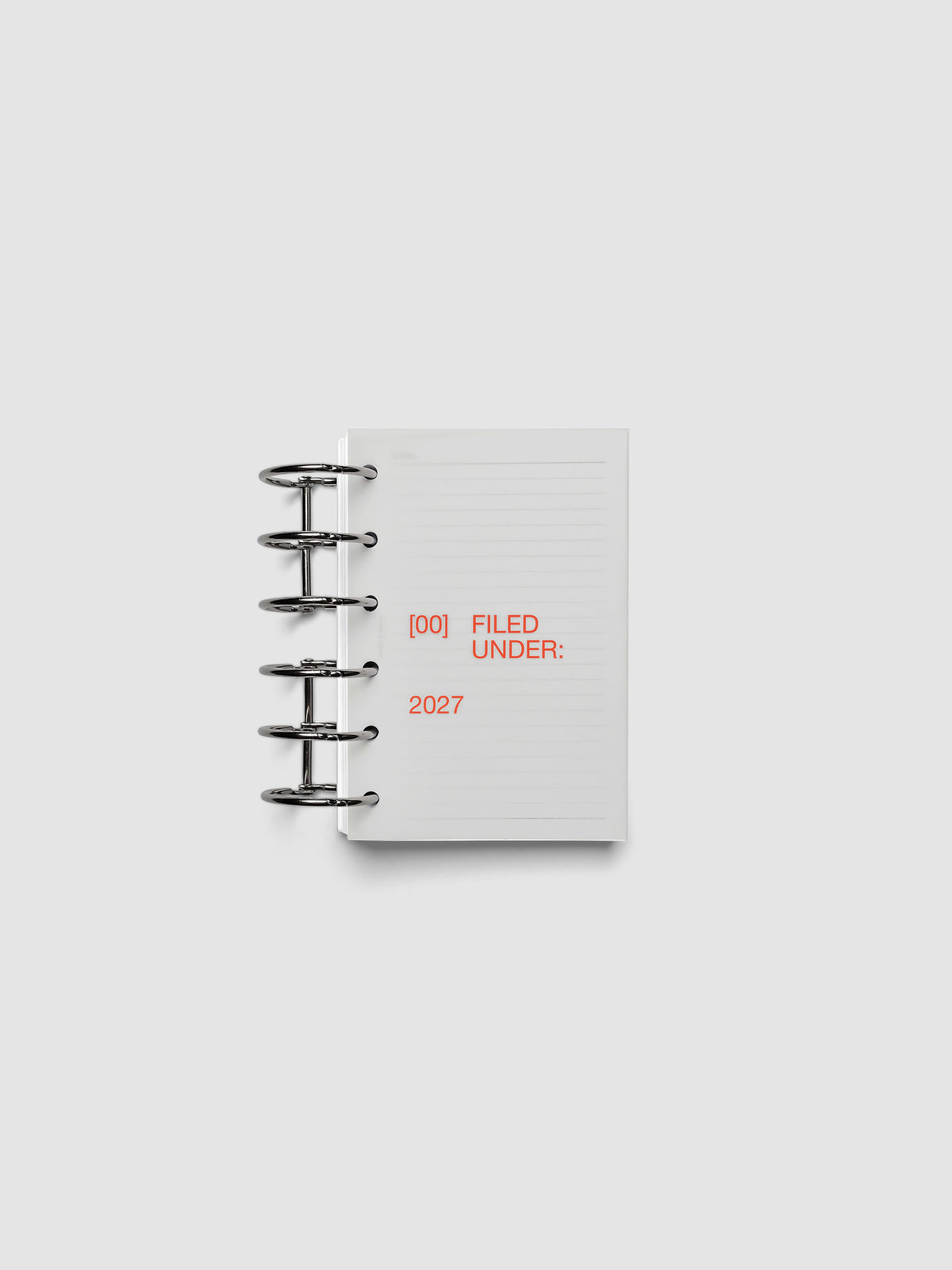 2027 Front + Monthly Dashboard Overlays, Saffron, Pocket 6-Ring Punch, vellum dashboard overlay shown layered inside a planner