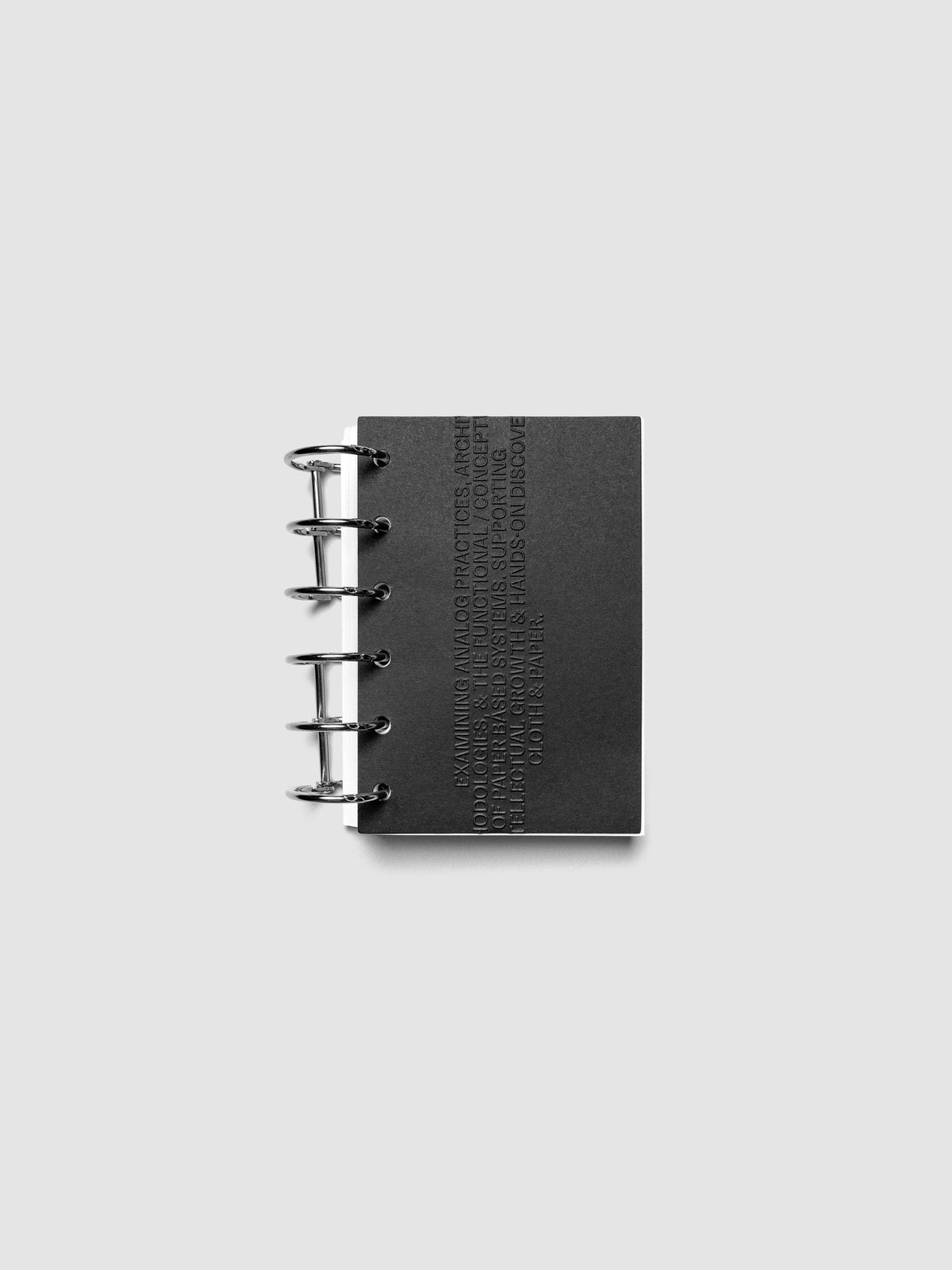 Black embossed Analog Embossed Planner Dashboard without drop card shown in size Pocket.