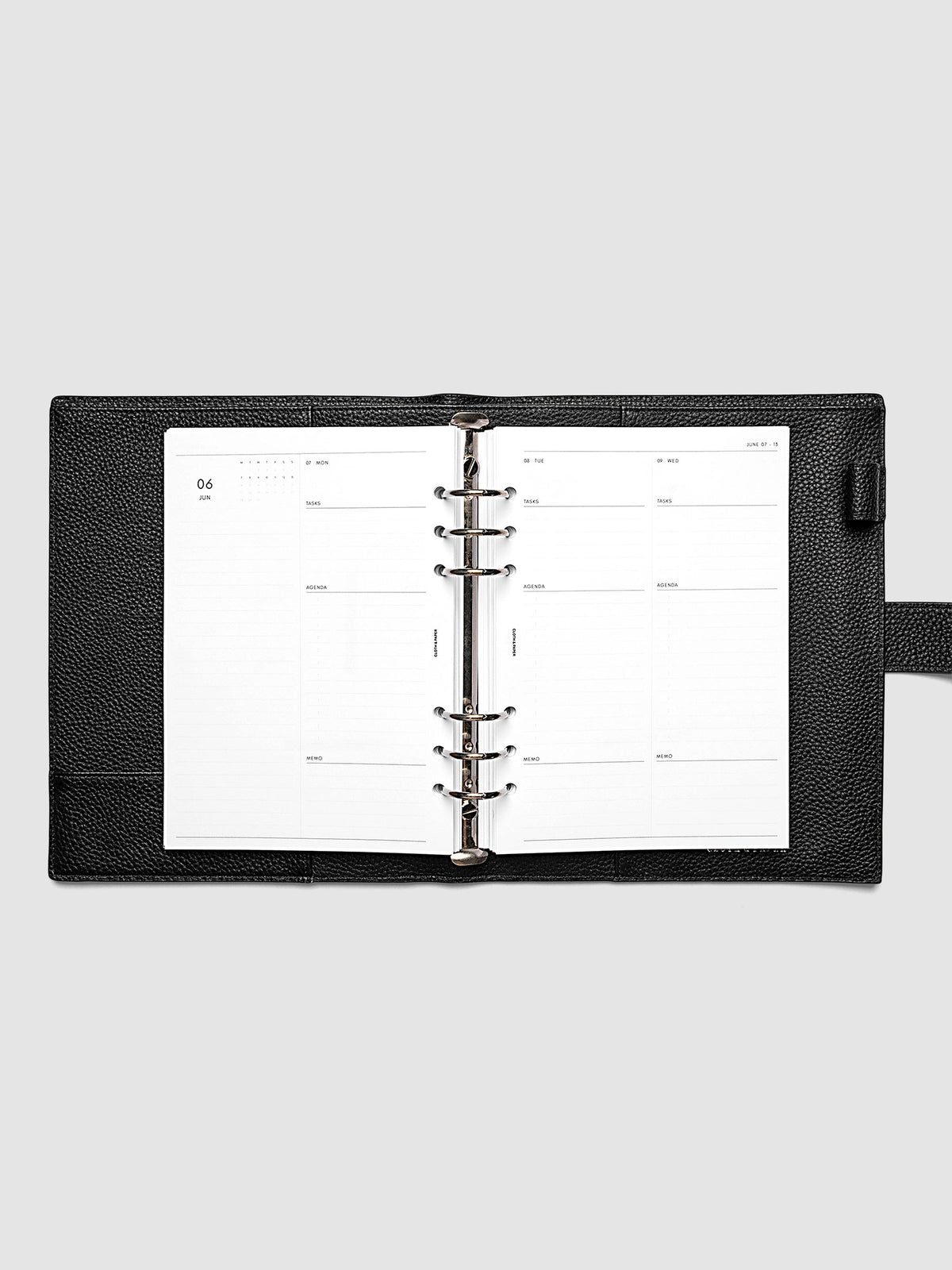 2027 Dated Daily Inserts | Monday Start in size A5 6-Ring Punch inside a black planner cover