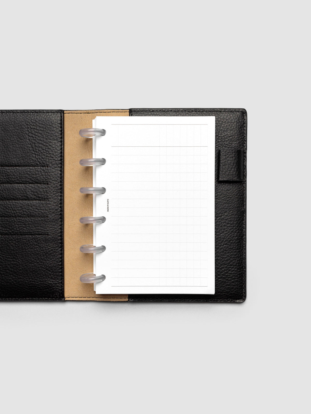 Inbox Sorting Planner Inserts shown pre-punched for discbound CP Petite planners in a black folio.