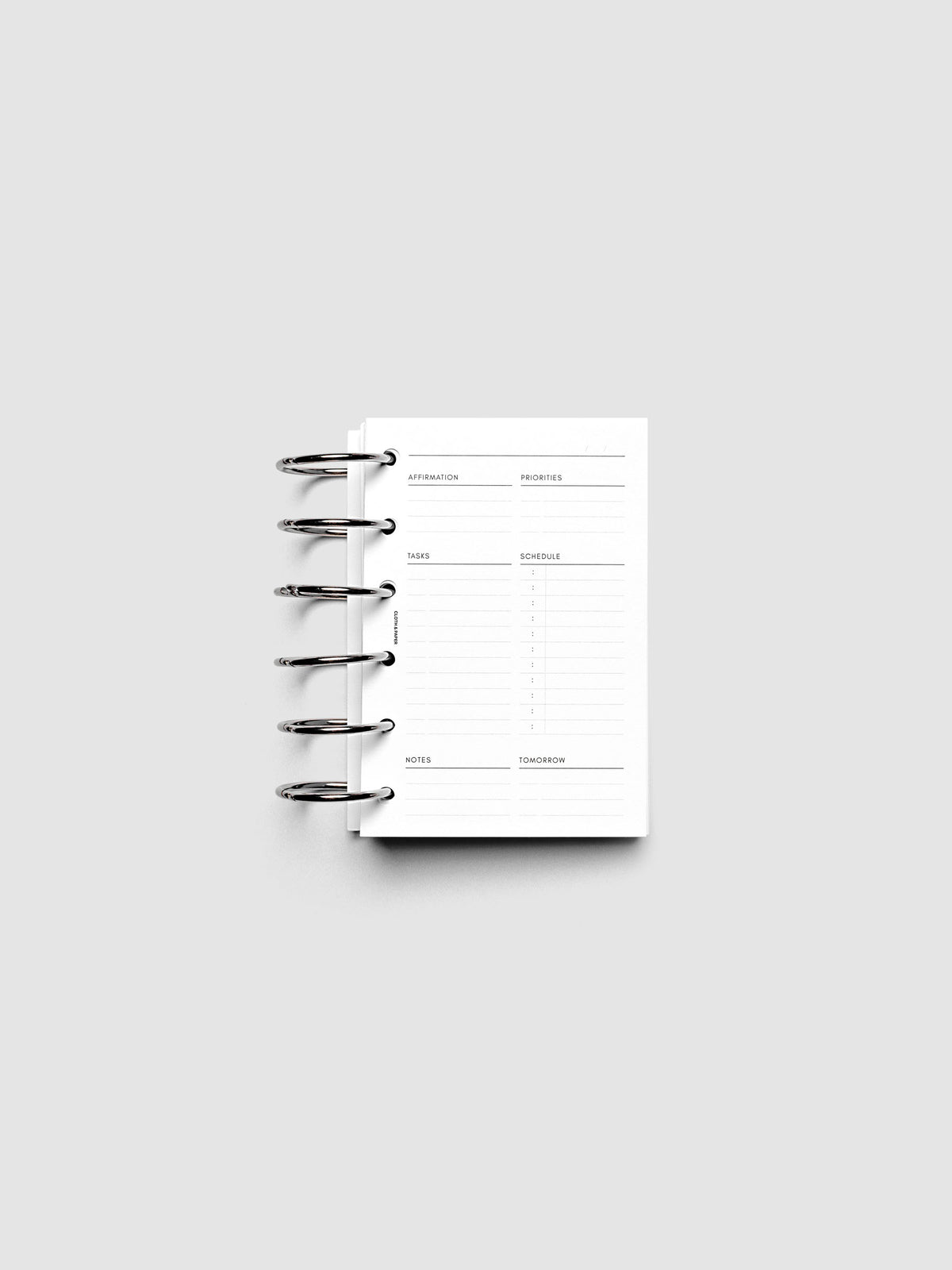 Daily Essentials Planner Inserts shown ring bound in size Pocket.