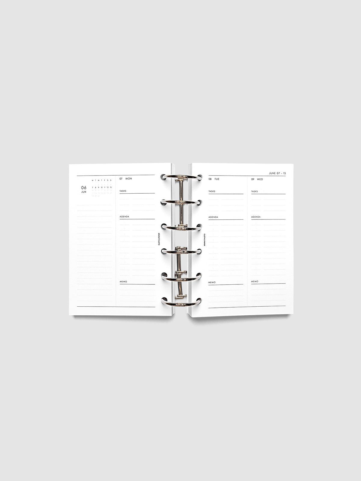2027 Dated Daily Inserts | Monday Start in size Pocket 6-Ring Punch inside a black planner cover