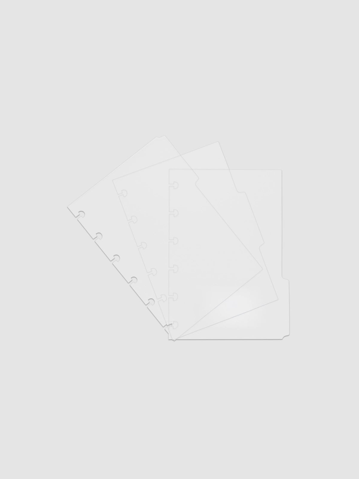 Three 6-disc punched clear side tab dividers sized for CP Petite planners.