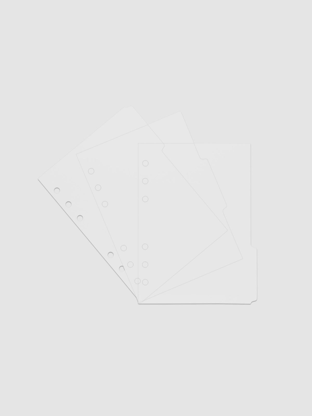 Three 6-ring punch clear side tab dividers sized for Personal Wide planners.
