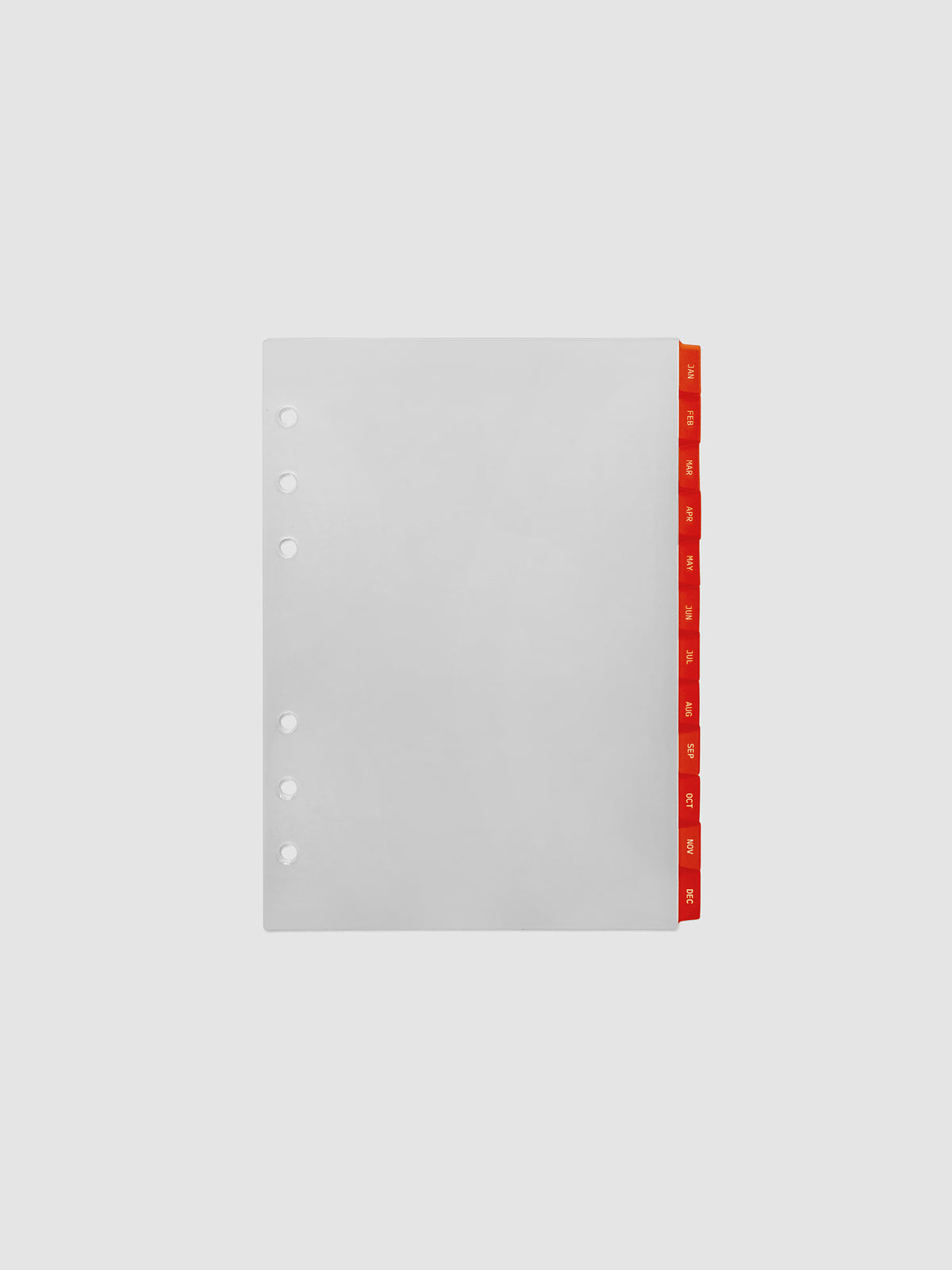 Personal Wide 6-Ring Punch Ultra-Thin Monthly Dividers in deep orange, set of 12 dividers fanned to show all months