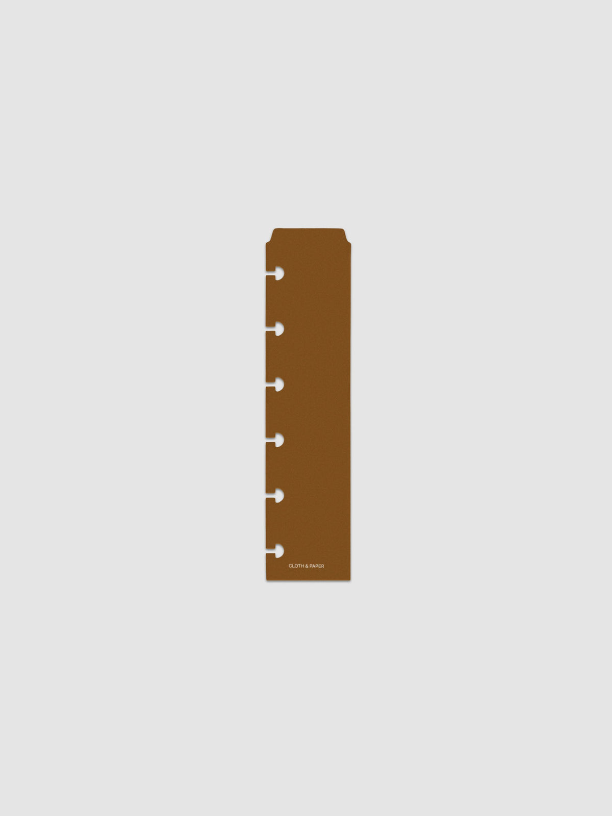 One narrow page marker in brown, shown in size CP Petite.
