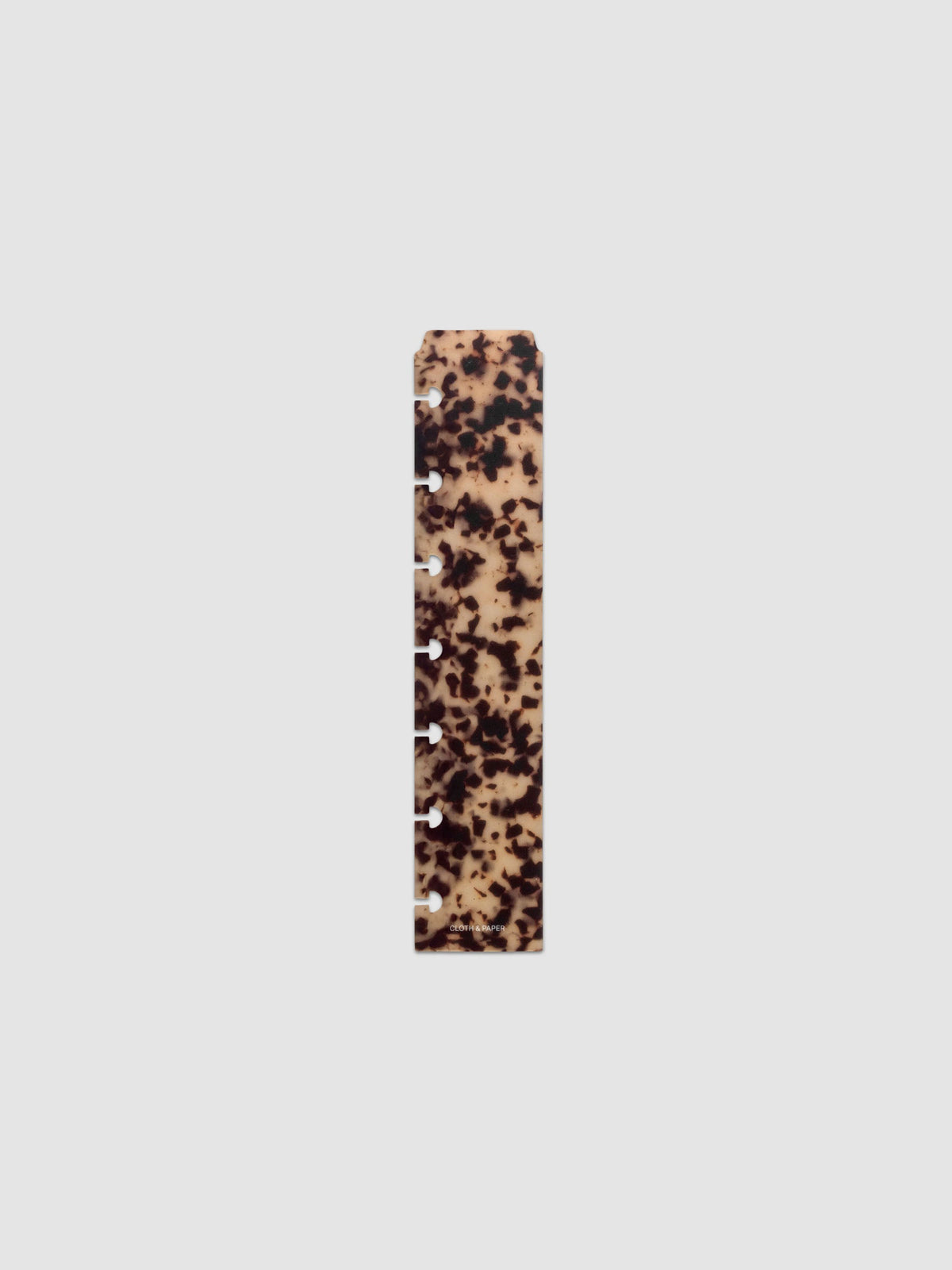 One narrow page marker in tortoiseshell pattern, shown in size HP Mini.