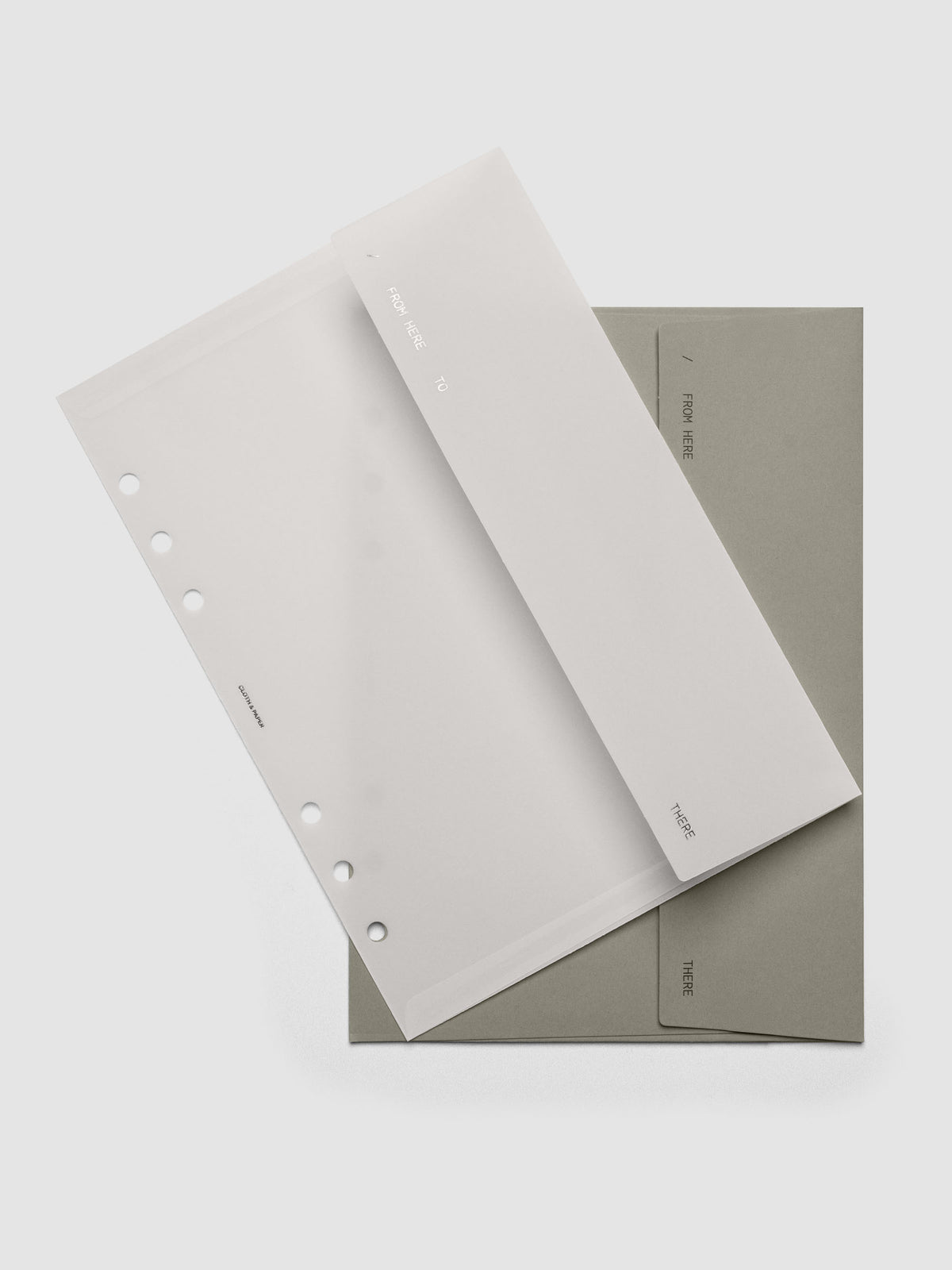 Envelope Storage Holder Set shown pre-punched for A5 6-Ring planners.