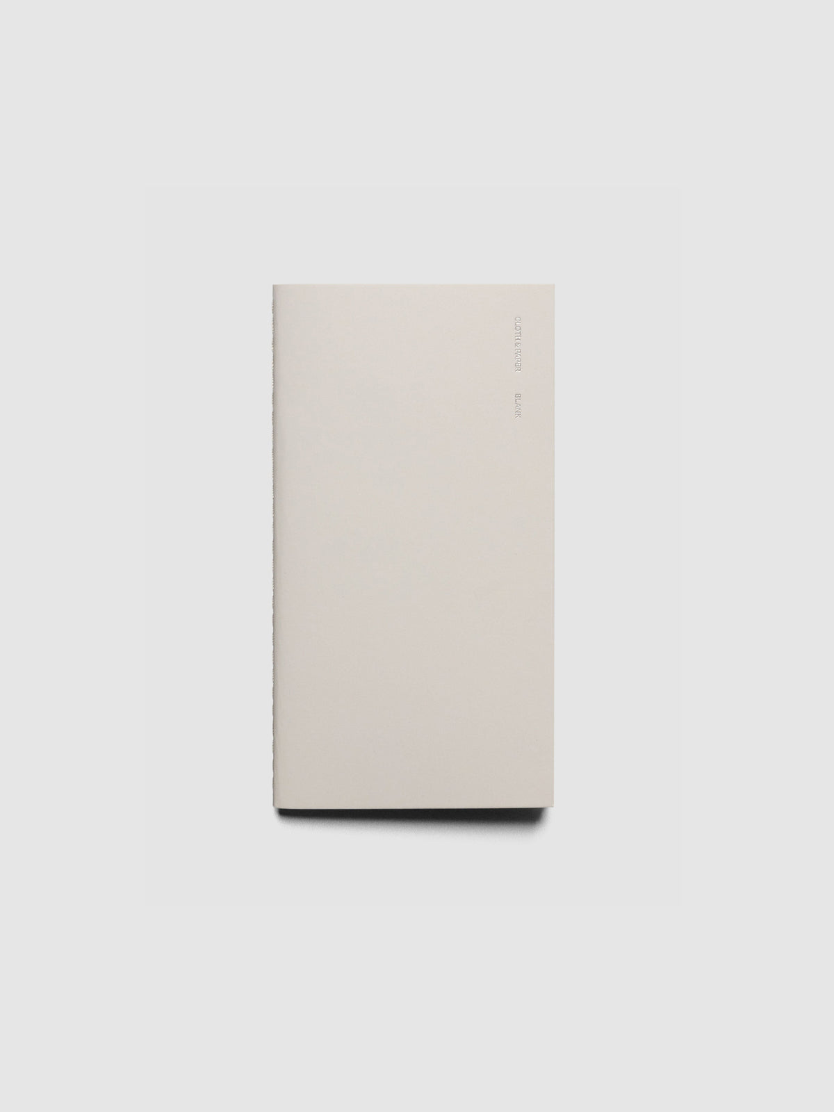Travel Notebook in size Pocket Plus in color Angora with Blank pages shown closed.