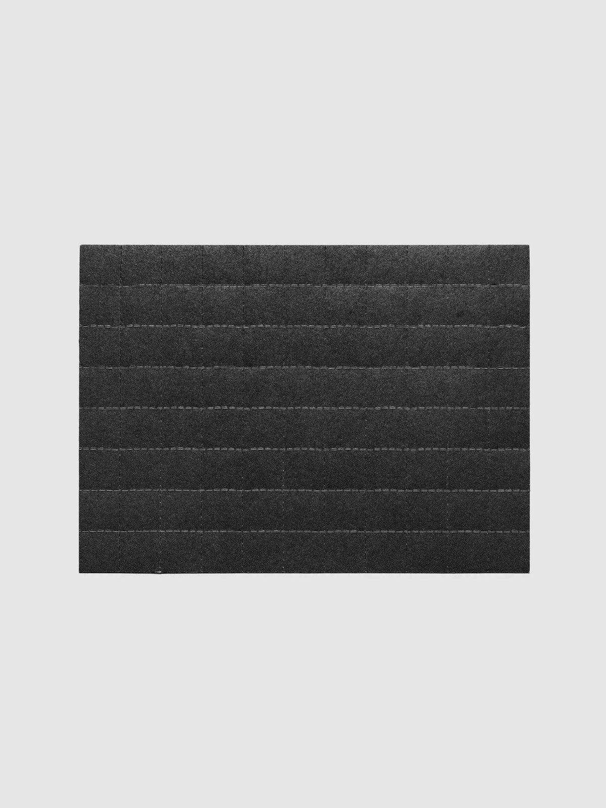 One sheet of black tear-off stickers