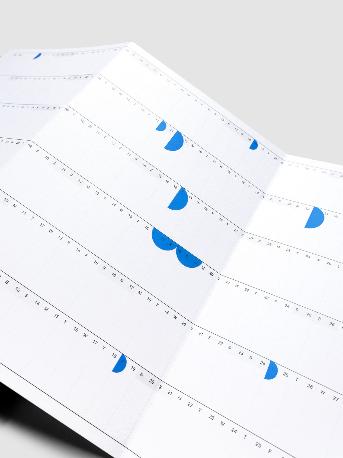 2026 Yearly Fold Out Planner Insert in size A5 shown un-folded, in use with stickers.