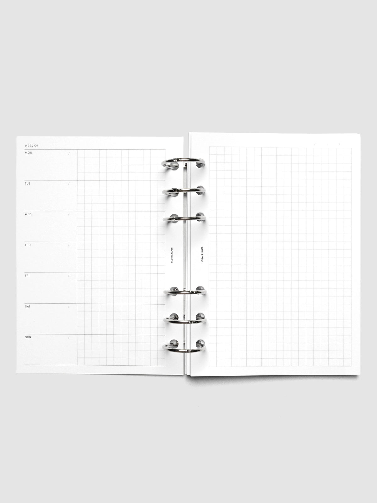 Weekly Graph Inserts in size A6 shown ring bound.