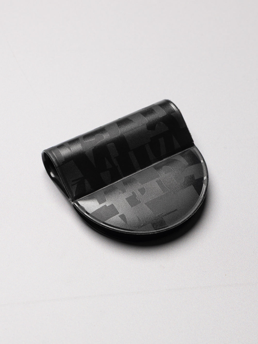 Black magnetic bookmark pen holder with spot gloss details