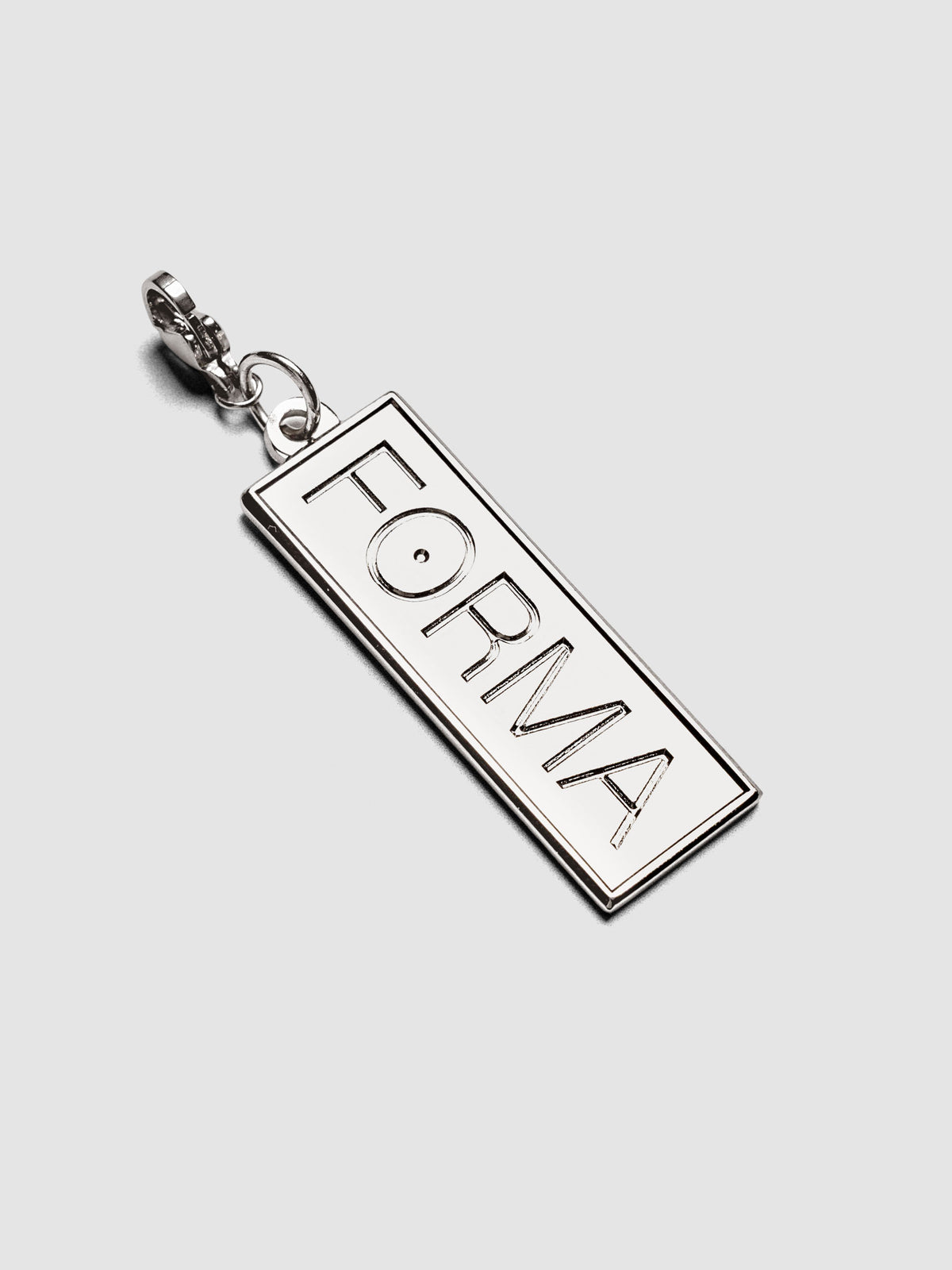 Travel Notebook Charms FORMA charm in embossed silver metal with lobster clasp attachment