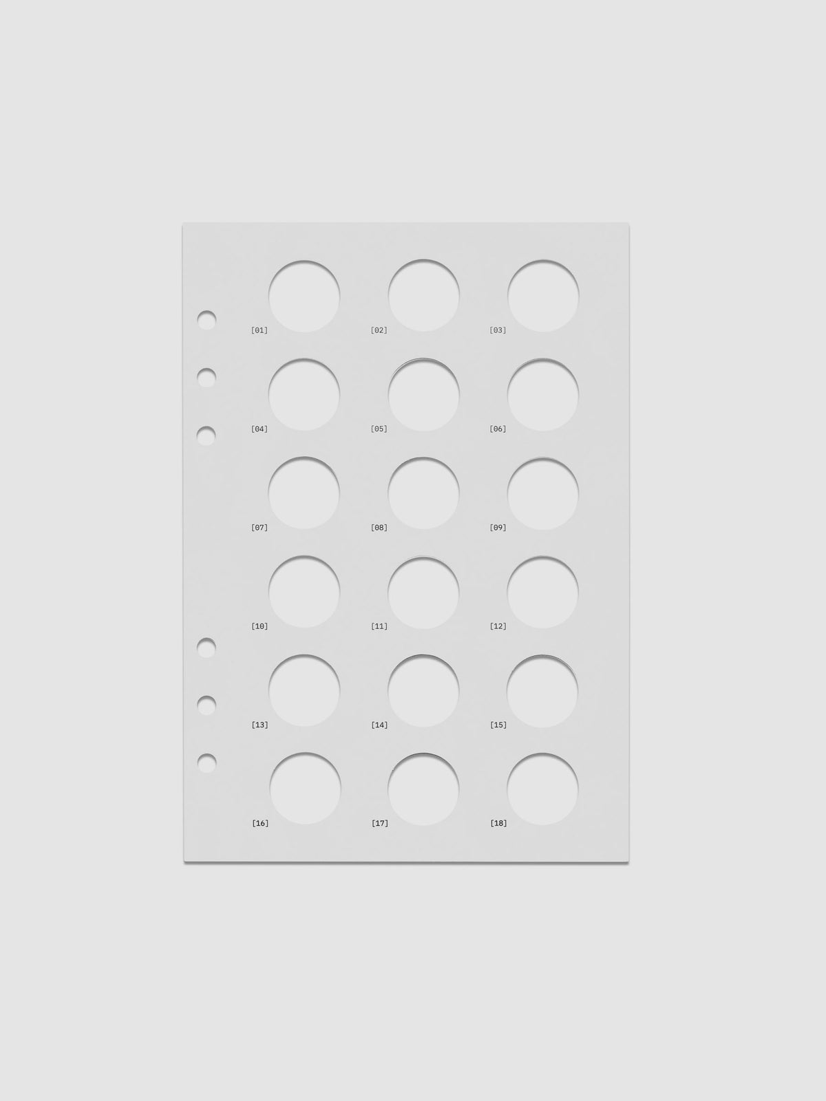One transparent dashboard with 18 circular cut outs. One piece from the Inner Blueprint Dashboard Duo shown in size A5.