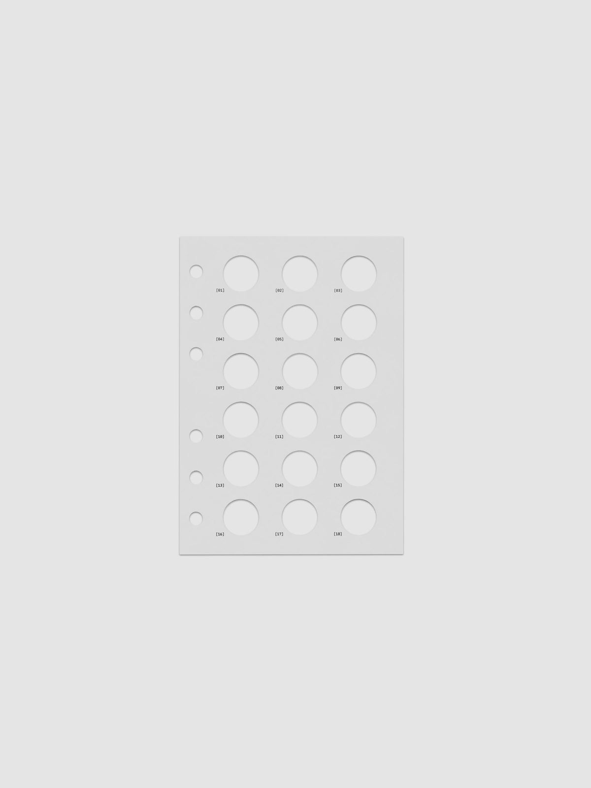 One transparent dashboard with 18 circular cut outs. One piece from the Inner Blueprint Dashboard Duo shown in size A6.