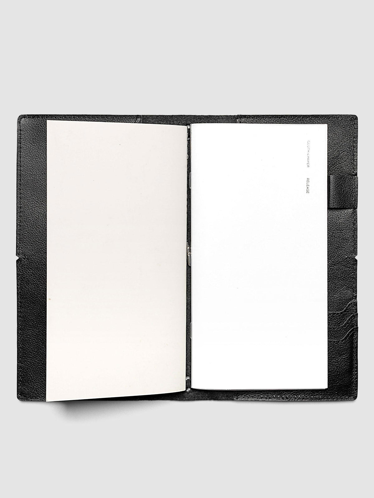 Release paper travel notebook insert in size A5 slim shown inside a travel notebook cover