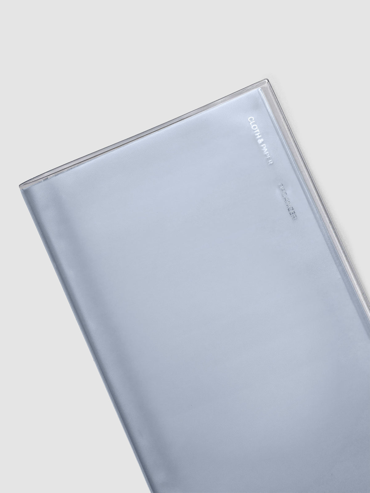 Close up view of A5 Slim sized clear organizer for stickers or ephemera with a clear vinyl cover.