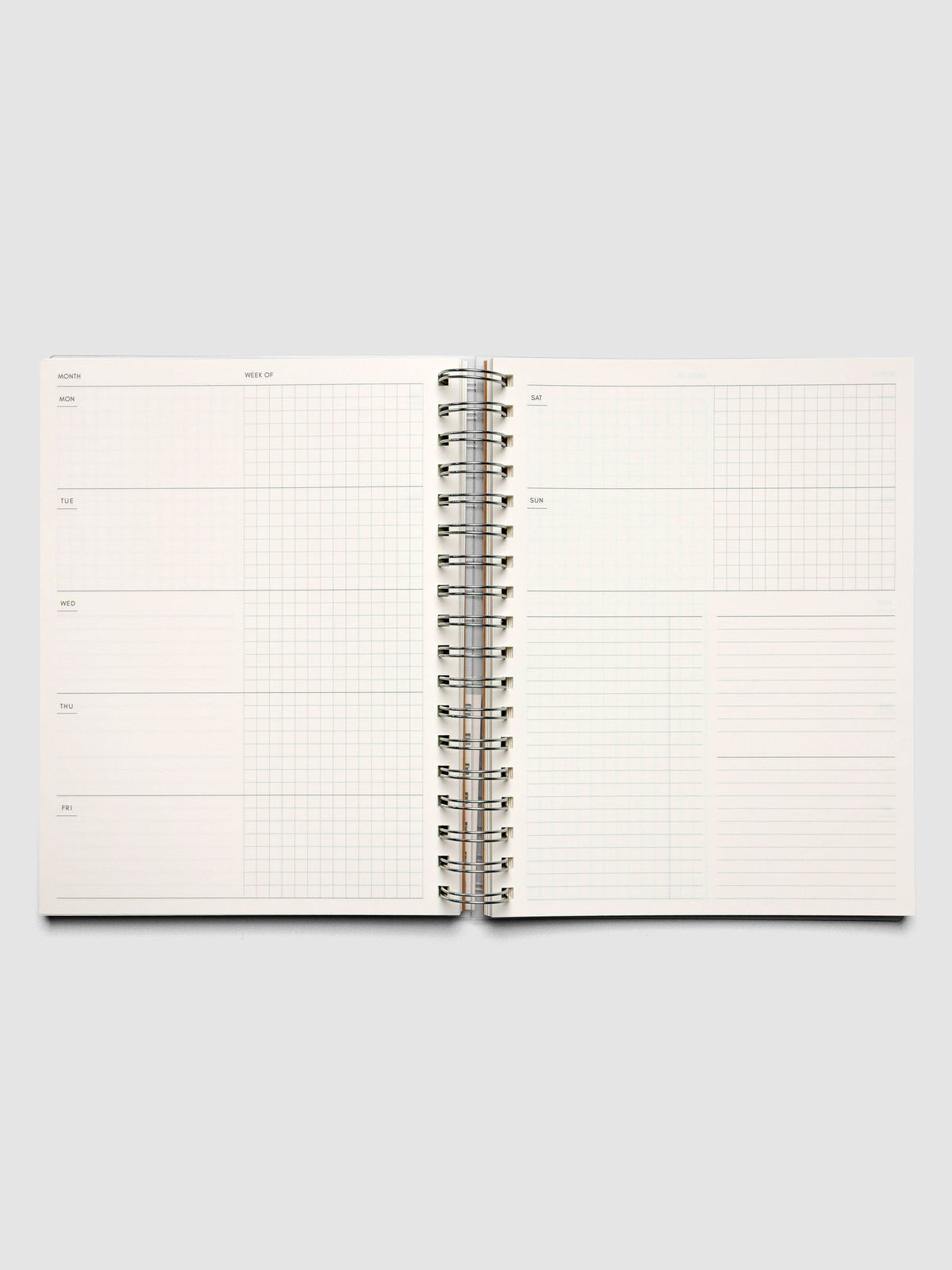 Spiral Notebook in size HP Classic and color Moscow (orange) shown open displaying Weekly Horizontal interior layout.