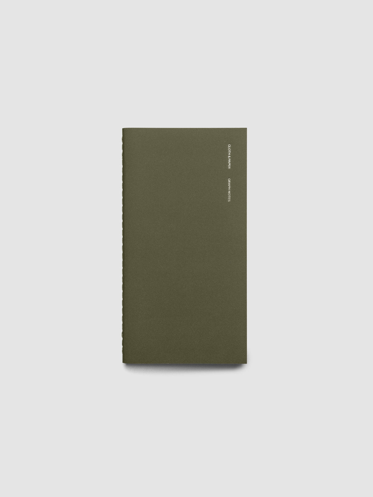 Exterior of a green pocket plus sized travel notebook.