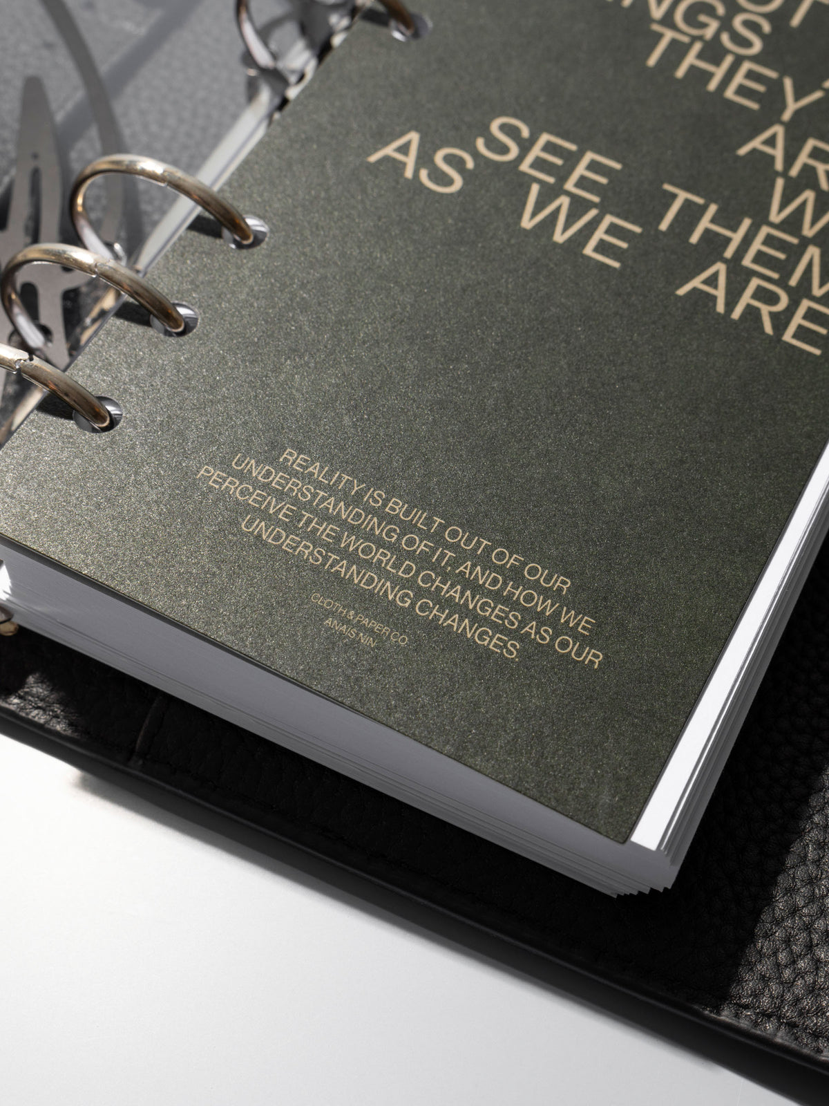 As We Are Cover + Dashboard Set in size Personal shown ring bound in a black leather agenda close up.