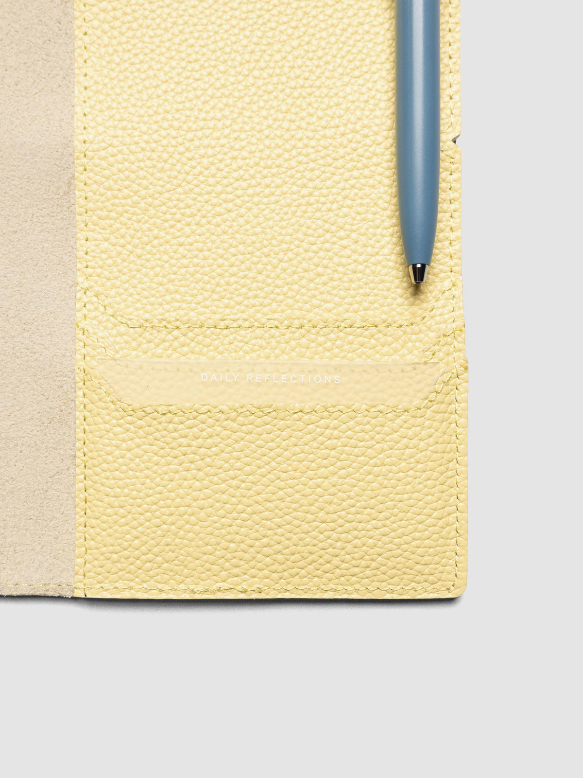 Butter yellow leather travel notebook cover in size A5 Slim showing interior credit card pockets.