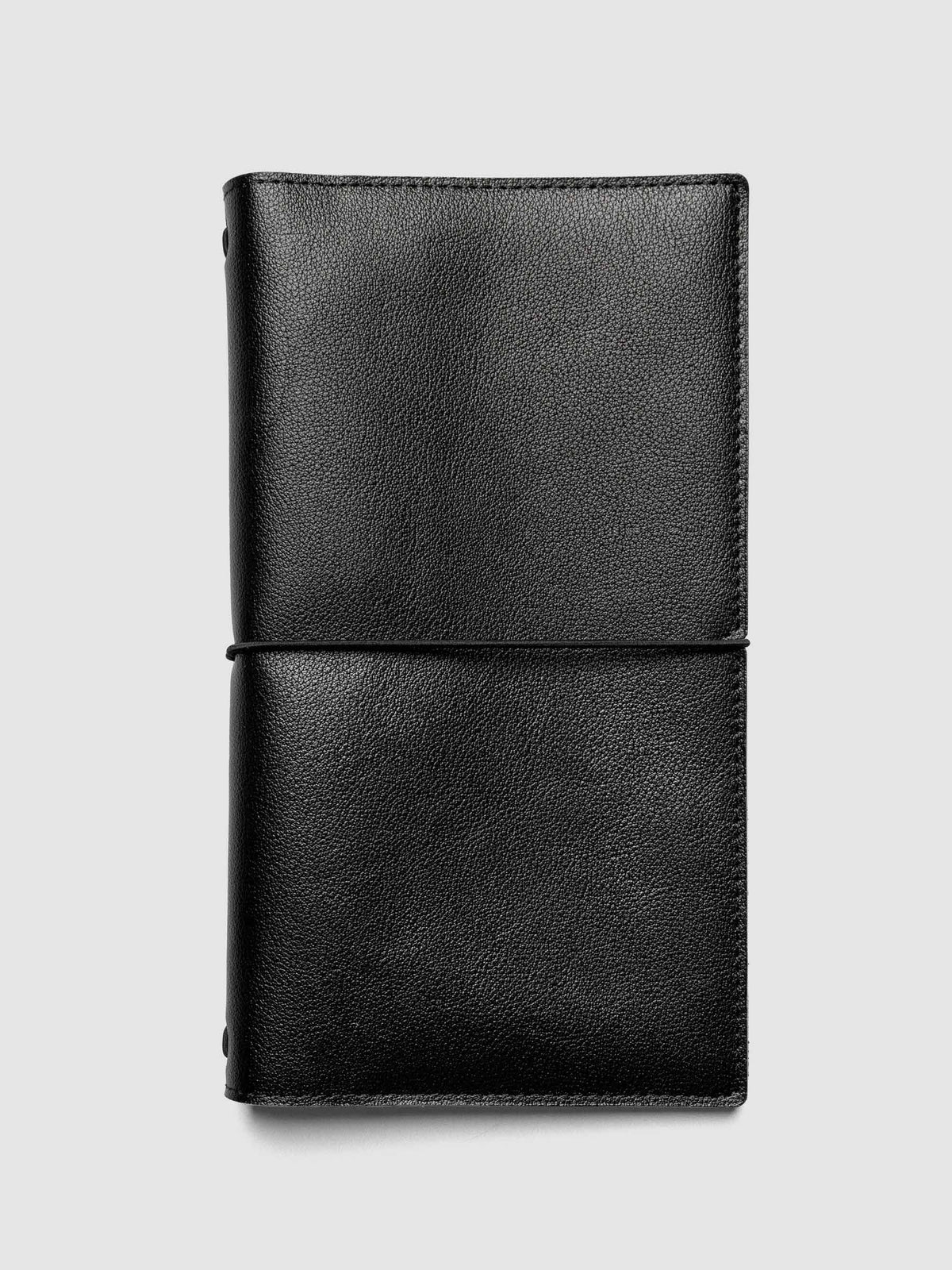 Black genuine leather travel notebook cover shown in size A5 Slim.