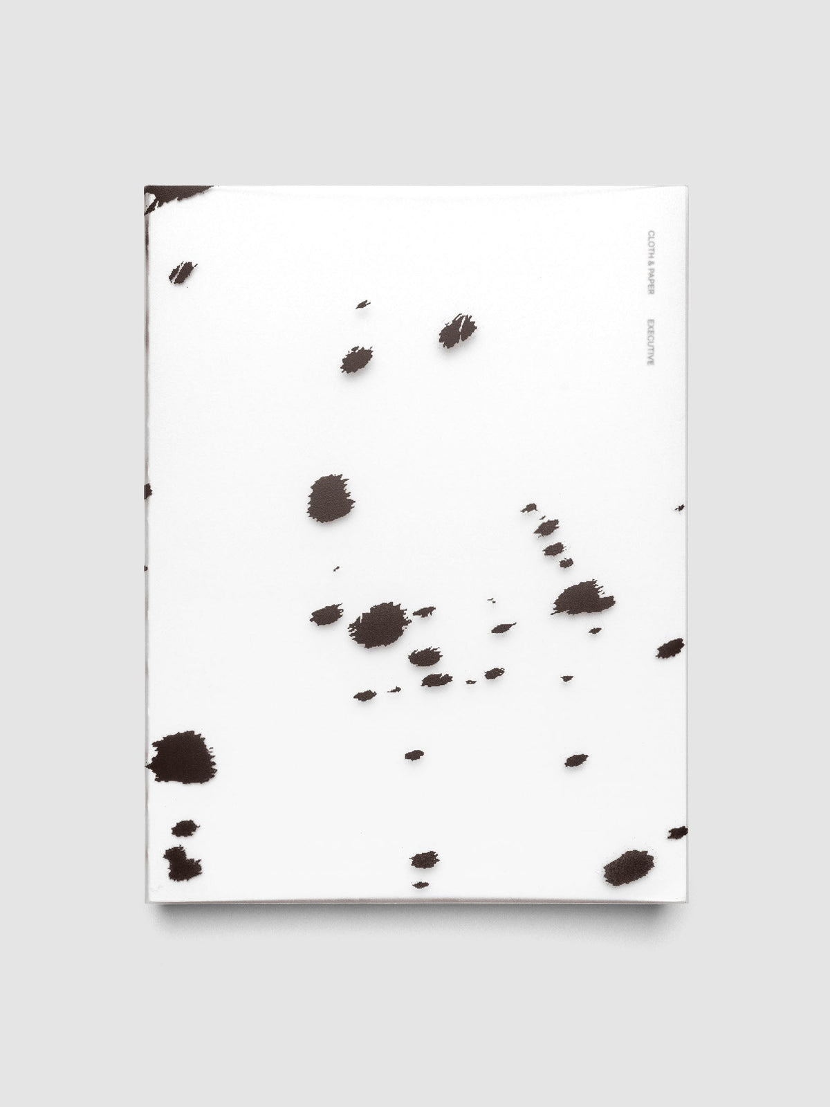 HP Classic frosted plastic notebook cover with brown dalmatian animal print pattern on a Perfect Bound Notebook