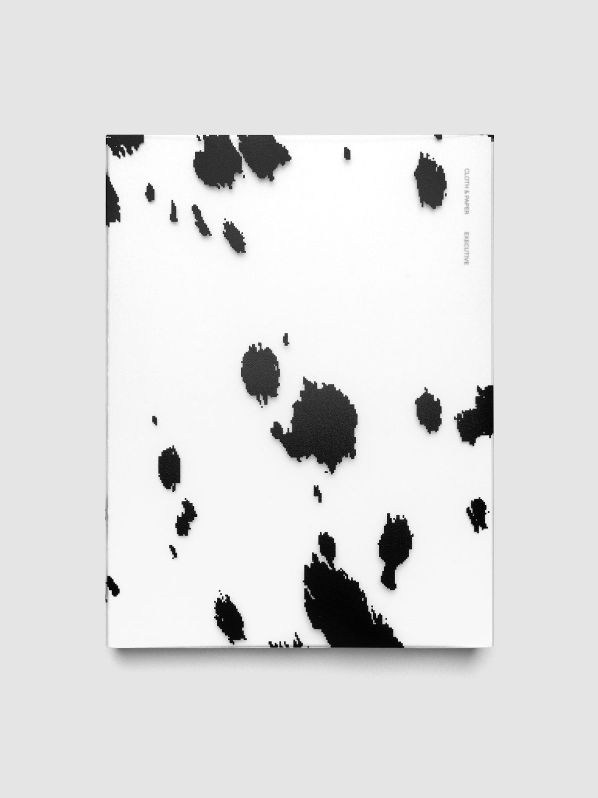 HP Classic frosted plastic notebook cover with black dalmatian animal print pattern on a Perfect Bound Notebook