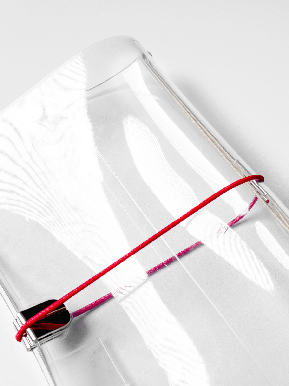 Red cover band in use on an A5 clear cover.