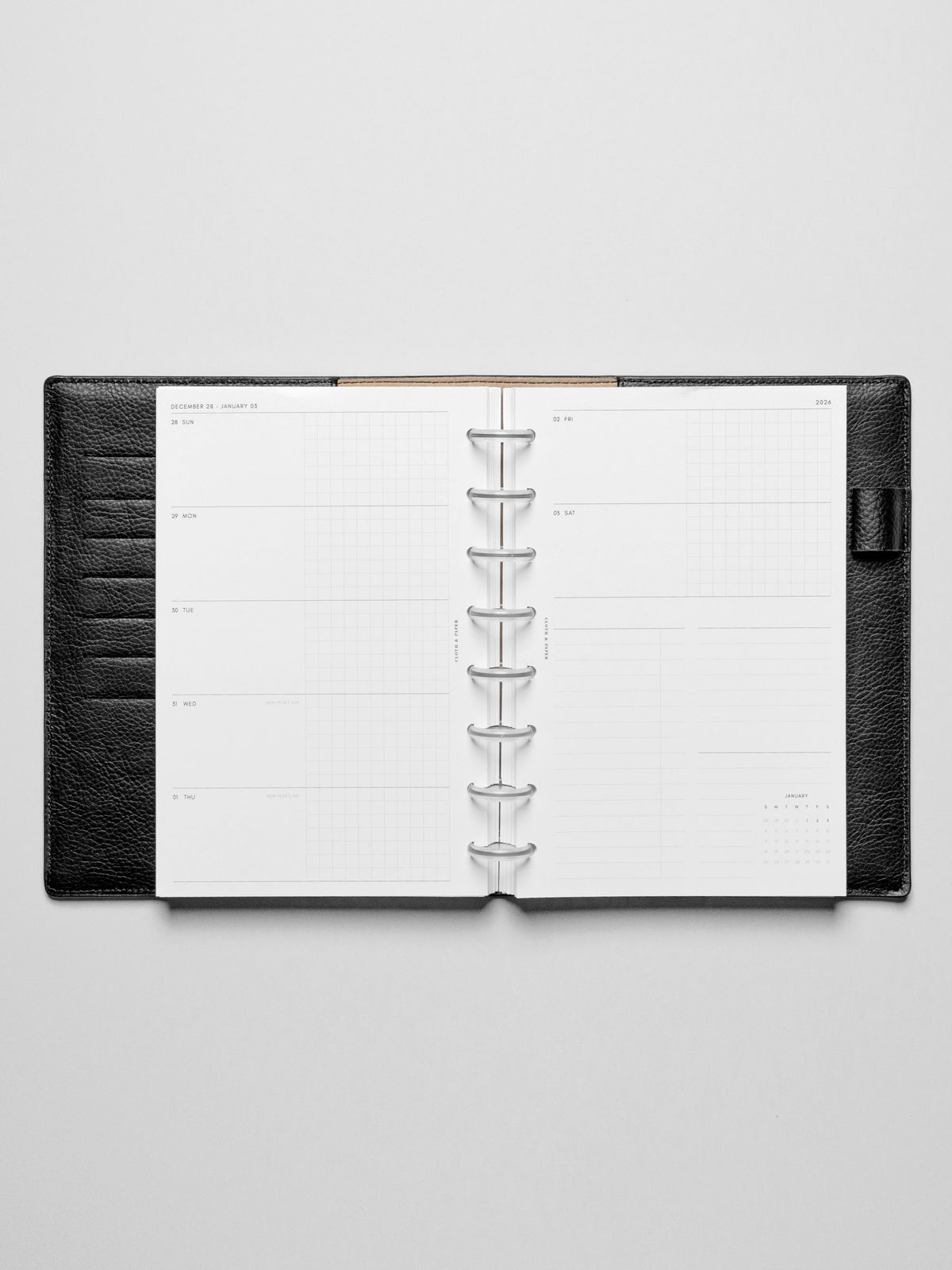 Inserts in use inside a leather planner.