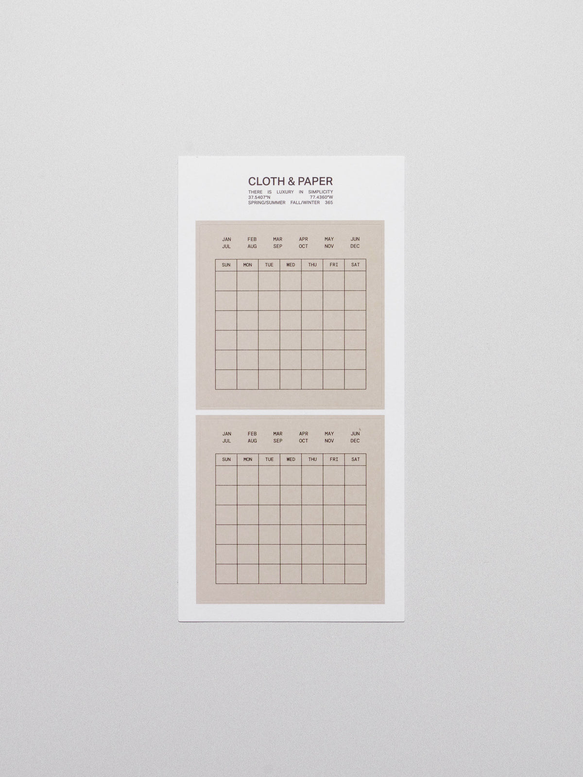 Calendar stickers displayed on a neutral background.