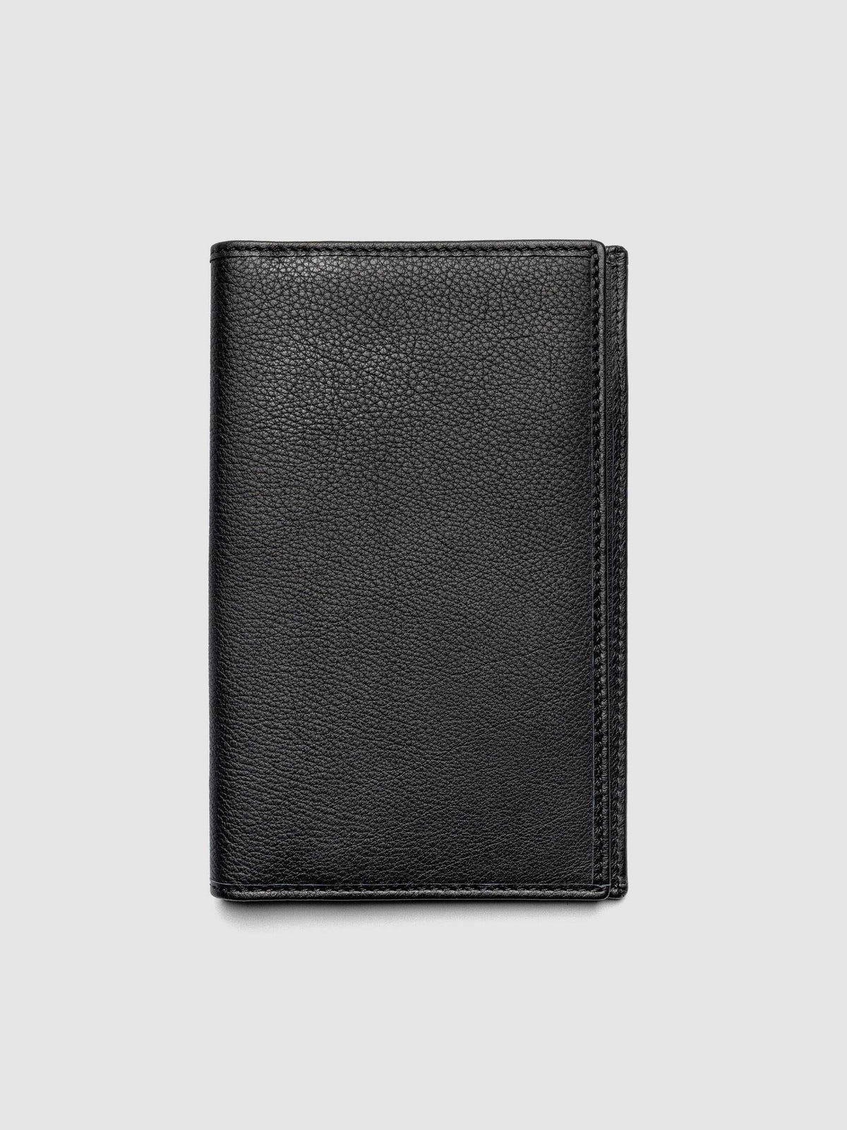 Nomada Wallet in Padrillo closed, showing black Spanish leather exterior