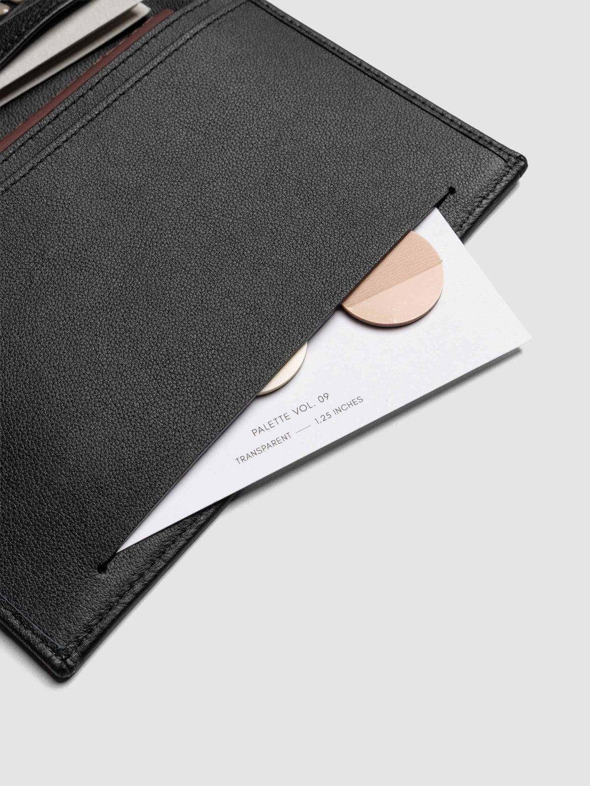 Close-up of Nomada Wallet slit pocket in Padrillo with page flags inside