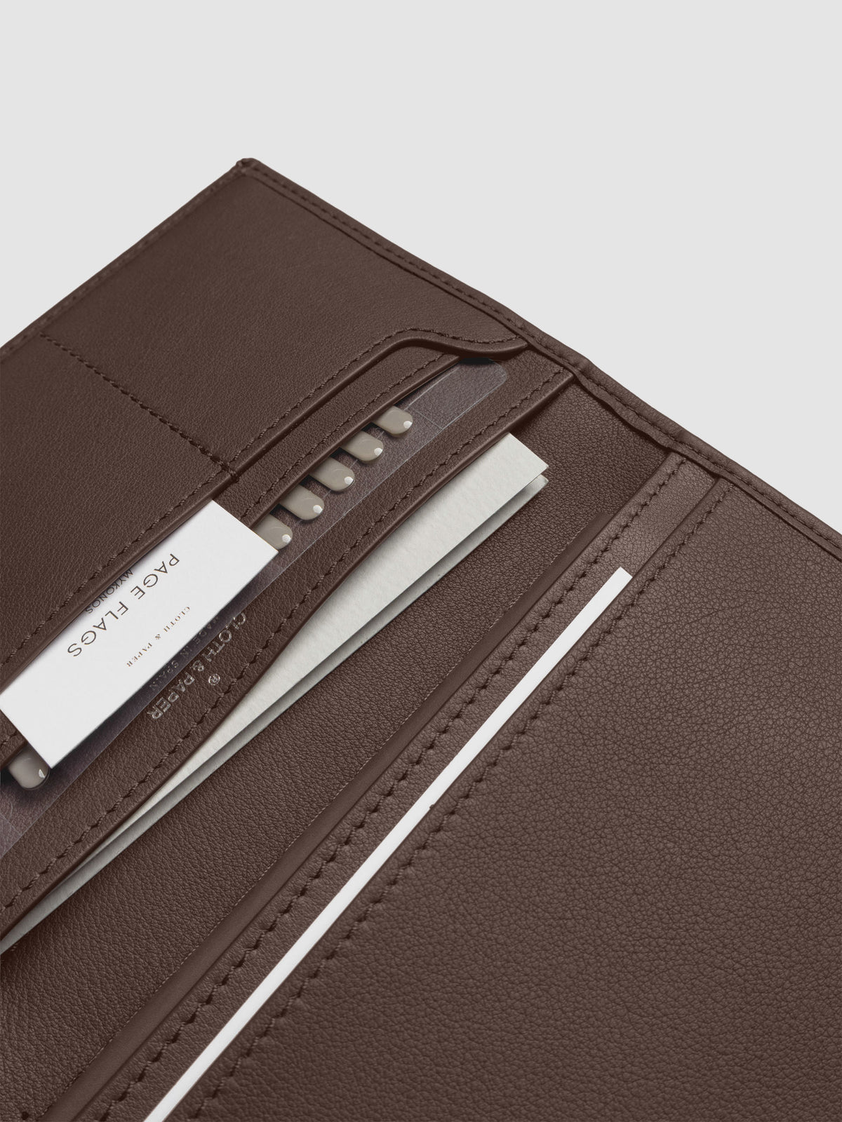 Close-up of Cloth & Paper products inside Nomada Wallet pockets in Cordoba